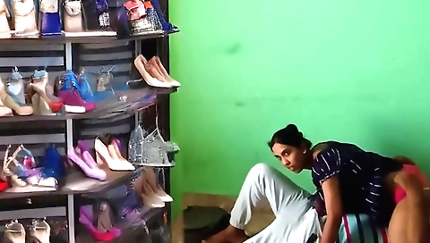 Indian slut in a white slipper shop sucking a dick