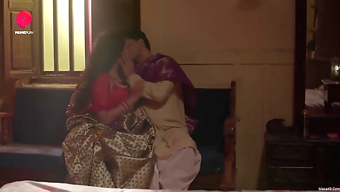 Brunette pornstar in lingerie and stockings is in the bedroom