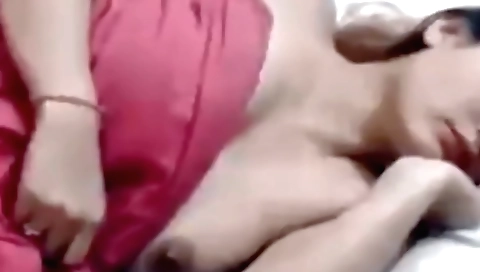 Sexy brunette in a sexy dress and stockings solo video