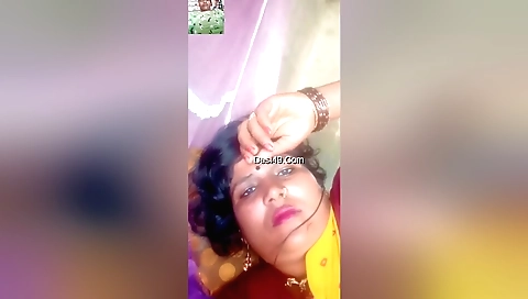 Sexy chick in a black dress is showing off her booty