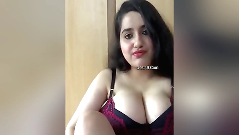 Indian babe in a sexy dress is showing herself on webcam