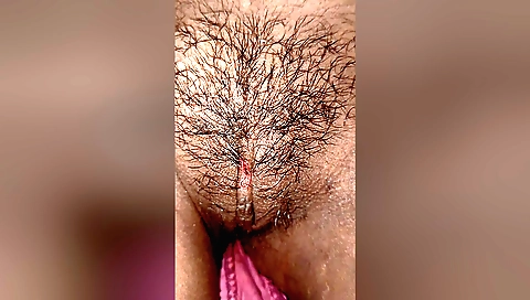 Indian hairy girl gets naked and masturbates in her bed