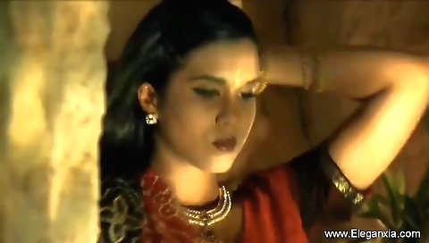 Sexy brunette beauty in white panties and sexy shirt