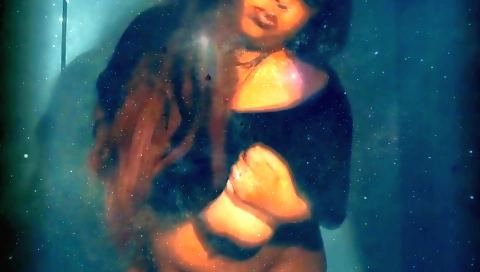 Sexy brunette 18+ girl in a sexy dress enjoys dancing