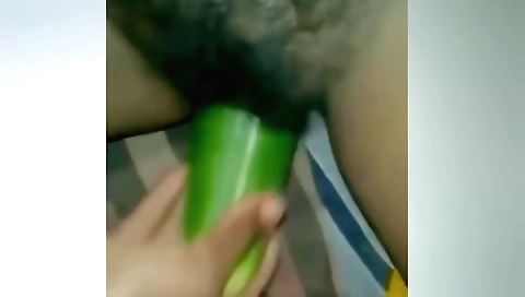 Indian girl masturbates with a dildo in amateur film