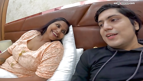 Amateur milf is showing off her big tits in this porn video