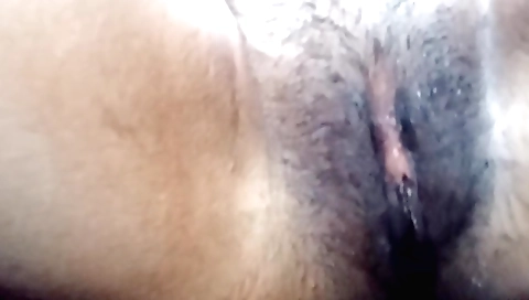 Indian girl in hairy pussy fucks naked in the studio