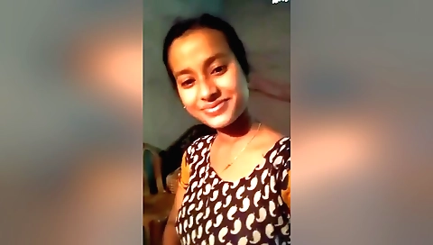 Sweet brunette in a white dress spreads her natural creamy pussy lips