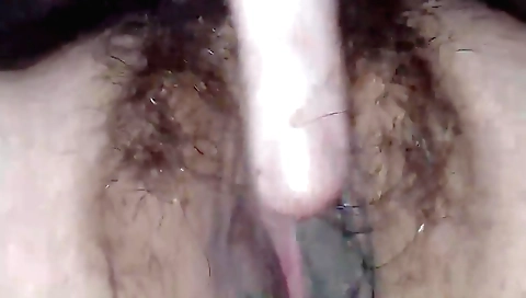 Hairy girl in lingerie puts her fingers inside her