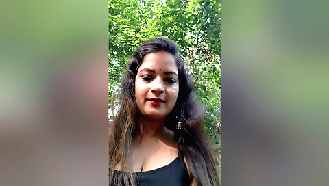 Indian brunette enjoys cooking dinner in the kitchen