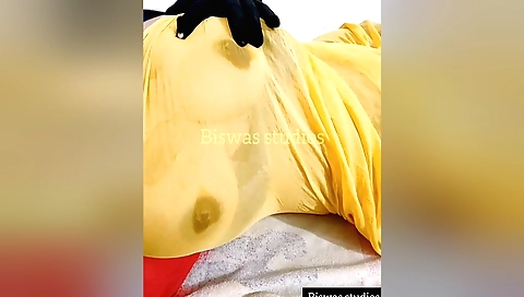 Indian beauties big tits stretched in bed in her yellow shirt