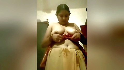 Sexy desi wife shows her juicy and round boobs on webcam