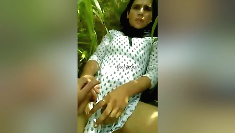 Indian girl with small tits plays with her cunt on stage