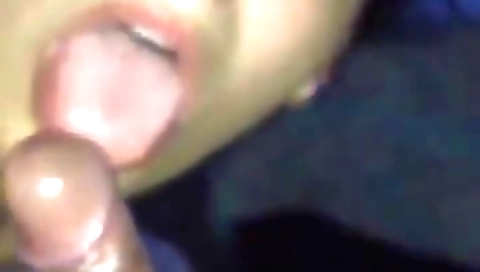 Mature brunette giving a blowjob and sucking a big dick in her mouth