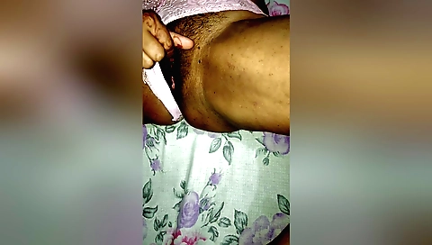 Hairy indian bhabhi gets naked and loves her pussy