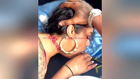 Indian woman in a red dress and black leggings filmed