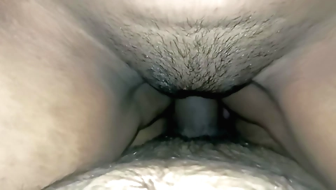 Indian babe with a hairy pussy gets off a big black dildo