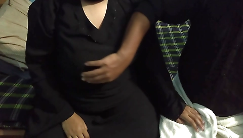 Chubby brunette in a small dress and blouse with a big ass