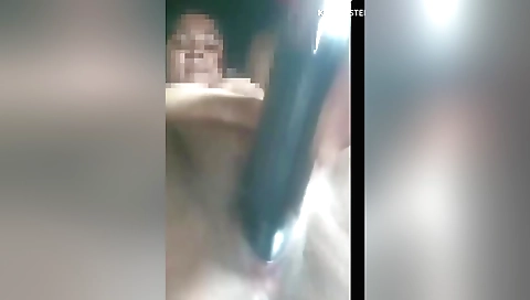 Indian milf gets fucked on her own bed by her own dildo