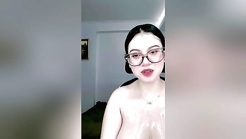 Stunning brunette beauty with big boobs gets naked