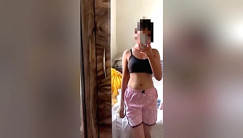 Sexy brunette naked in her bedroom and naked in her window